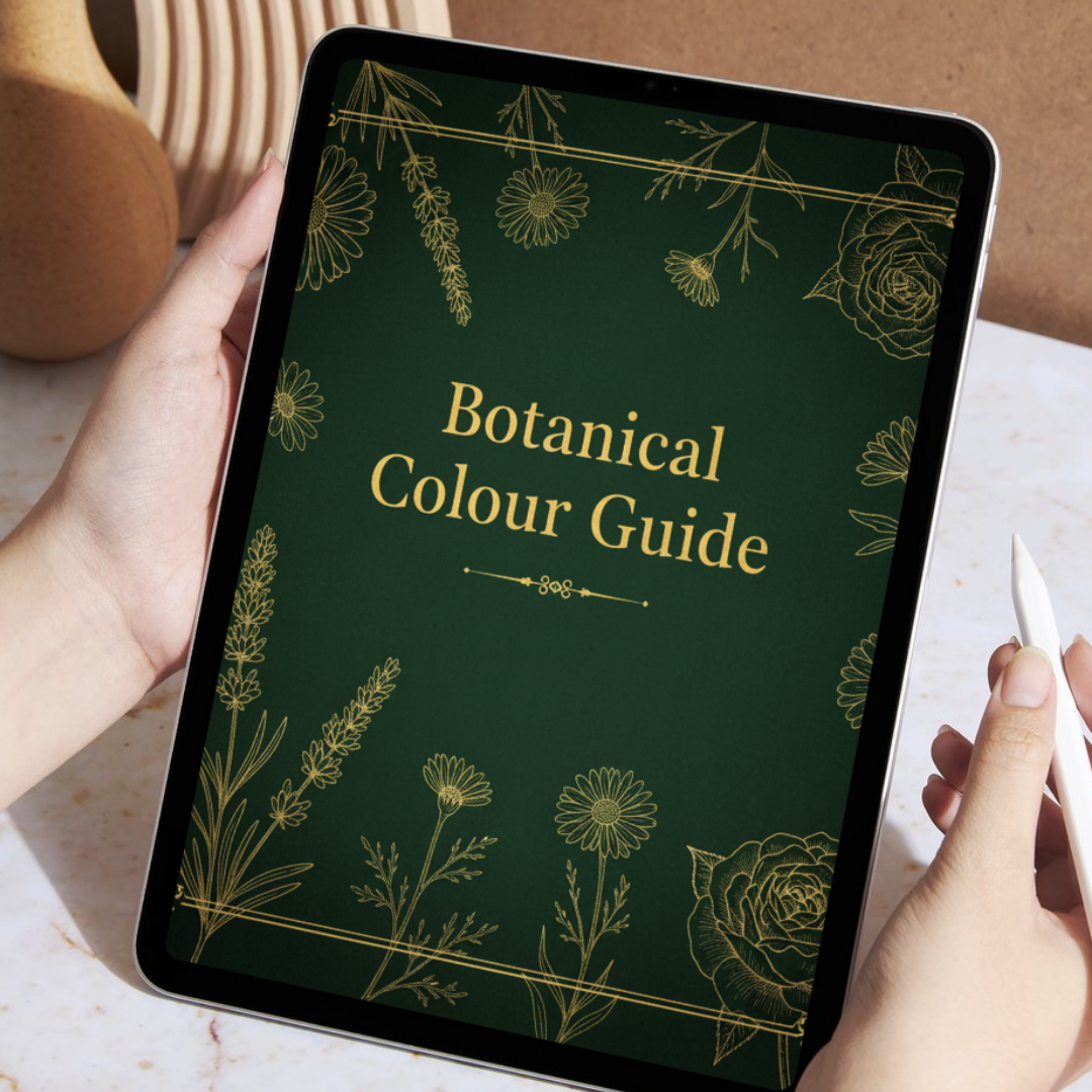 Hands holding a tablet showing the Botanical Colour Guide cover